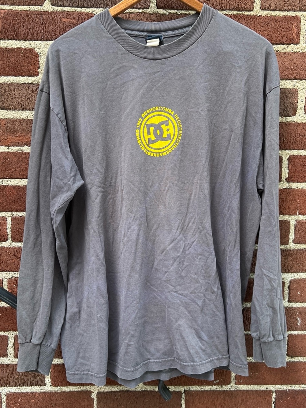 DC Men's Gray Long Sleeve Tee with Yellow Crest Logo